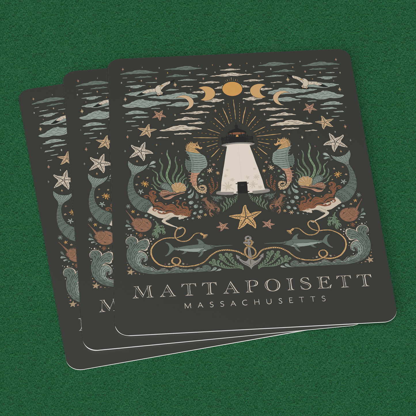 Mattapoisett_Playing_Cards_3_Cards_Angle_Mockup.png