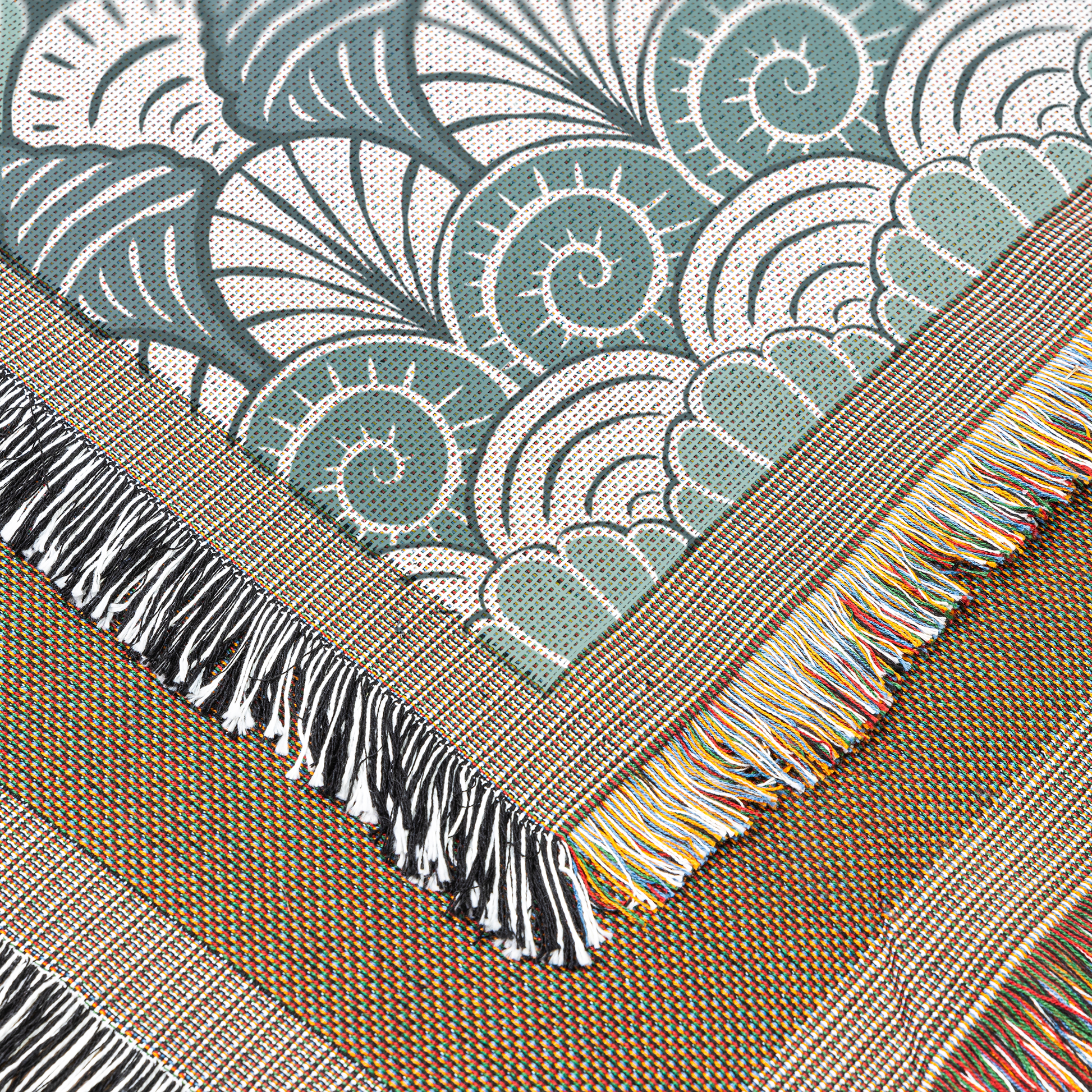 Blue_Seashell_Pattern_Woven_Blanket_CloseUp_V_Mockup.png