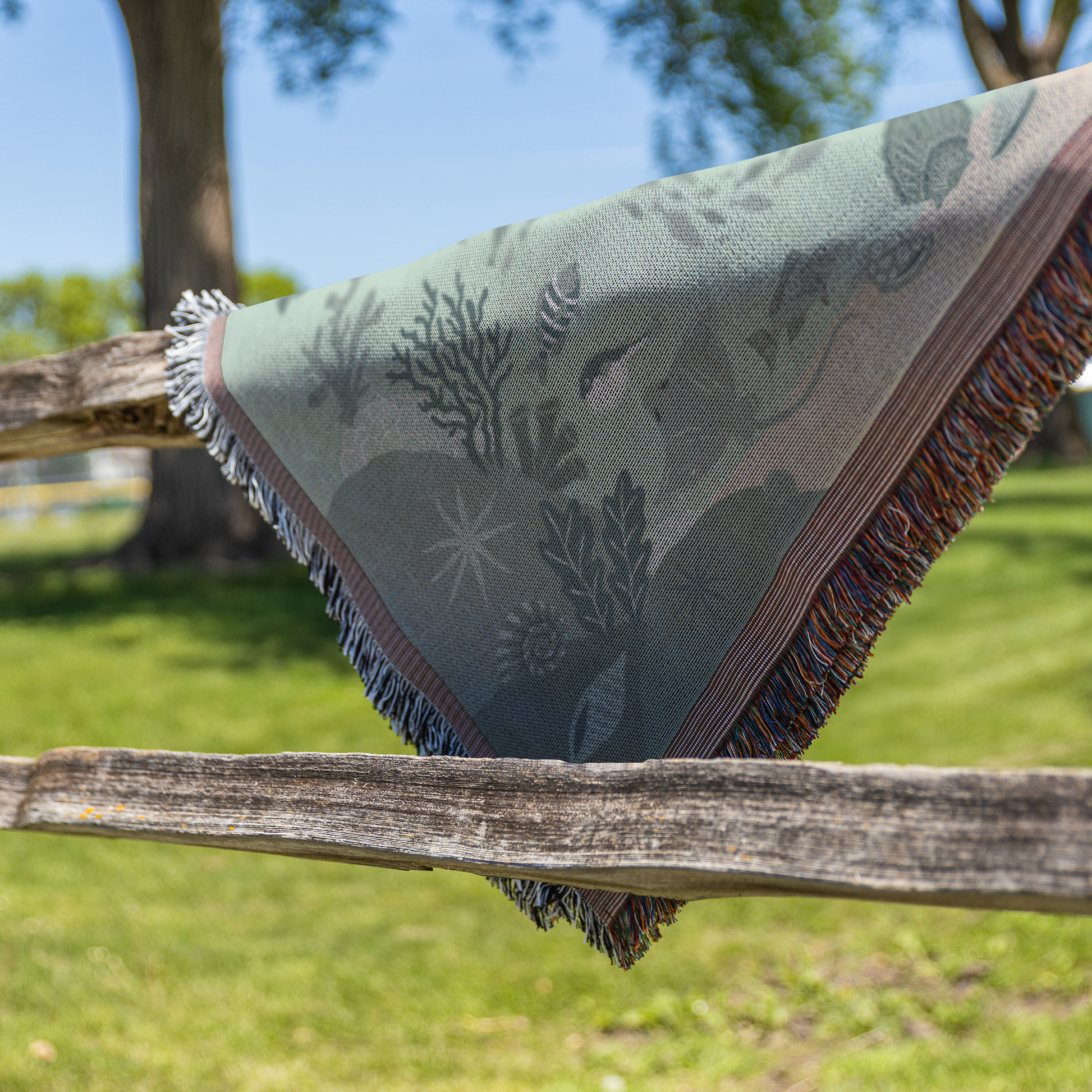 Sunset_on_Sanibel_Woven_Blanket_Fence_V_Mockup.png