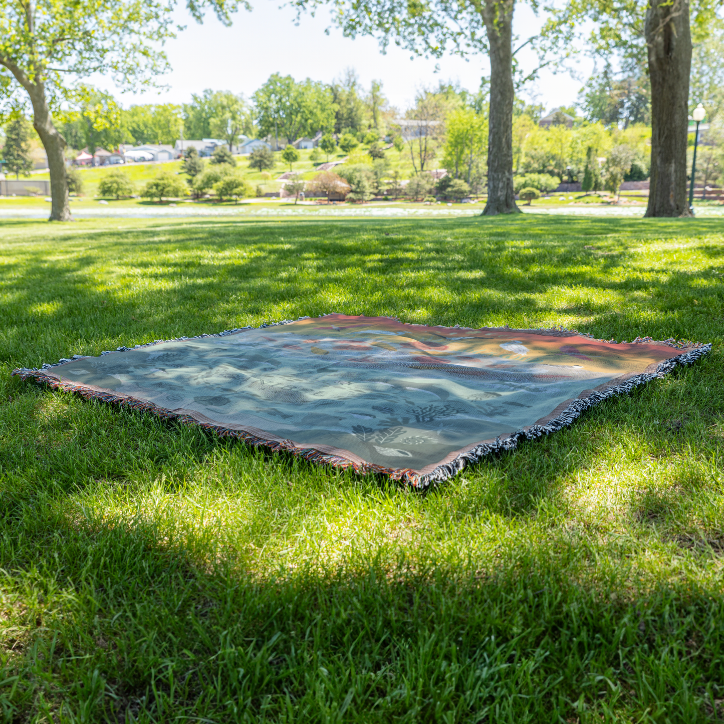 Sunset_on_Sanibel_Woven_Blanket_Grass_V_Mockup.png